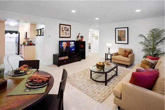 a living room with a table and a television
